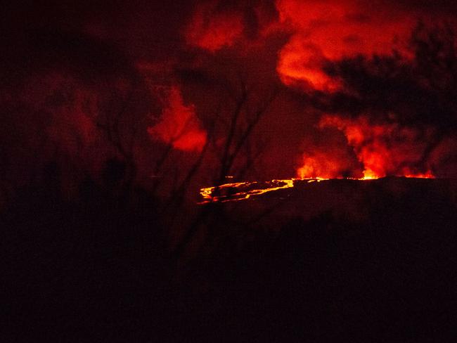 Spewing lava and hot ash in a spectacular display of nature's fury by Mauna Loa. Picture: AFP.