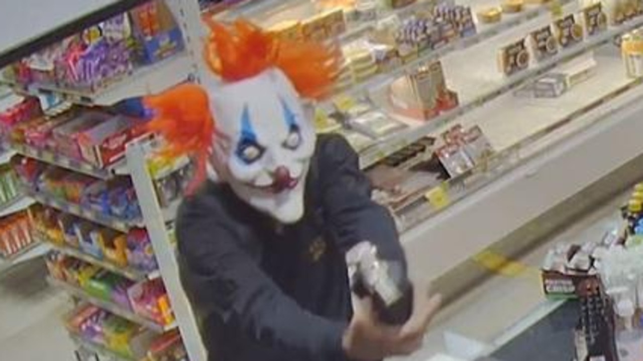 Terrifying footage as clown robs servo