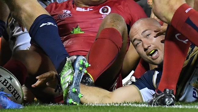 Robbie Abel of the Brumbies scores a try during the Round 7 Super Rugby match between the ACT Brumbies and the Queensland Reds on April 8 2017. (AAP Image/Dean Lewins)