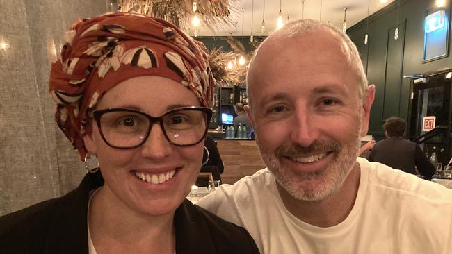 Reena Murray with her husband celebrating the end of her chemotherapy.