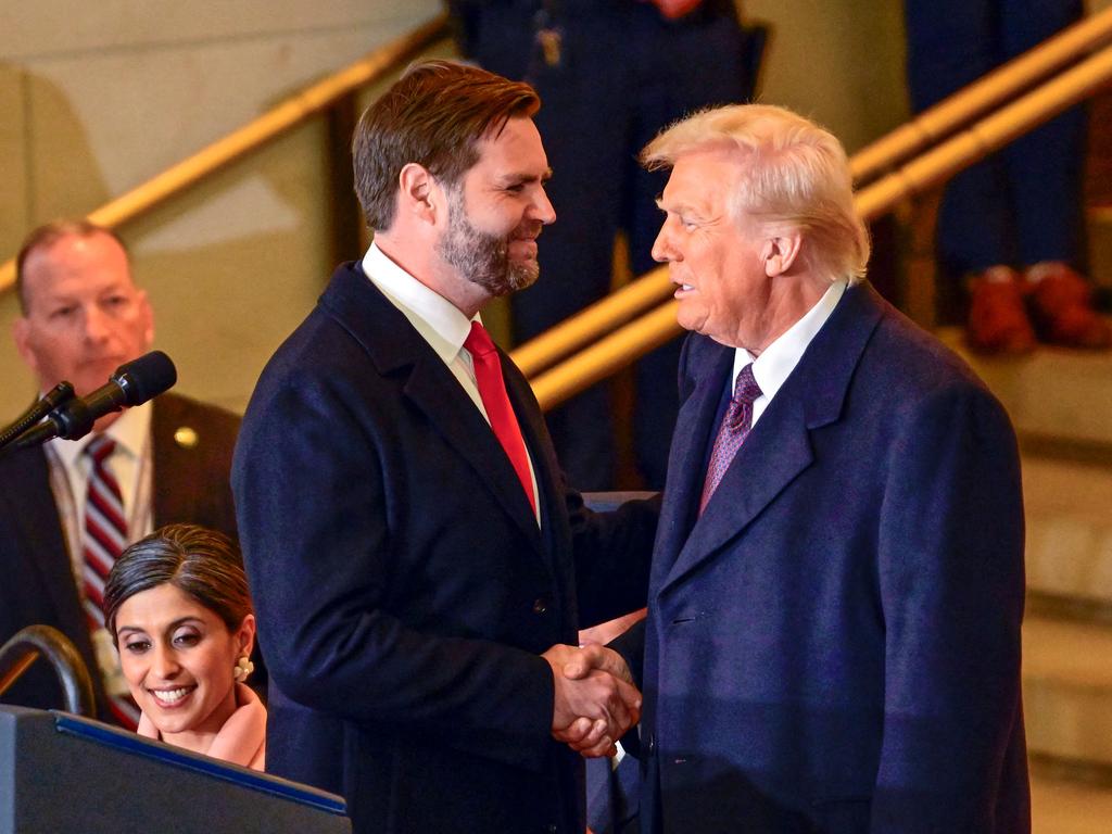 Donald Trump shakes hands with JD Vance. Picture: AFP