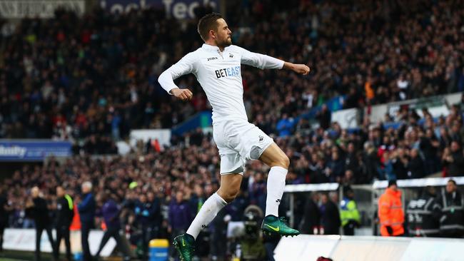 Gylfi Sigurdsson of Swansea City celebrates scoring.