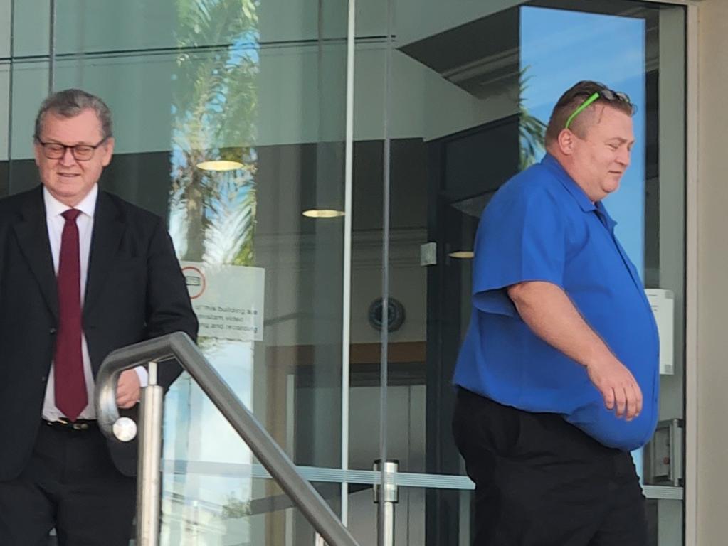 Craig Paul Carrington (right) at Rockhampton Courthouse with David Mills, part of his legal team.