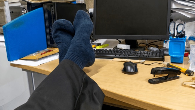 Is it ever OK to take your shoes off at work? Image: iStock 