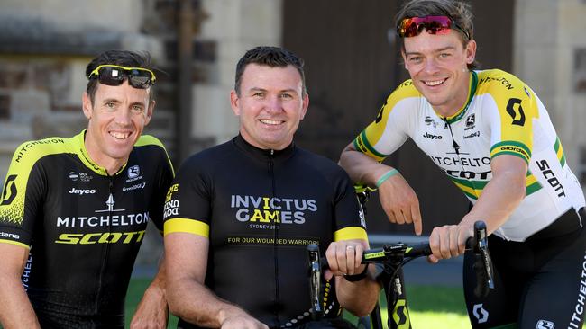 Invictus Games cyclist Garry Robinson with Mitchelton-Scott pair Mathew Hayman and Alex Edmondson. Picture: Naomi Jellicoe.