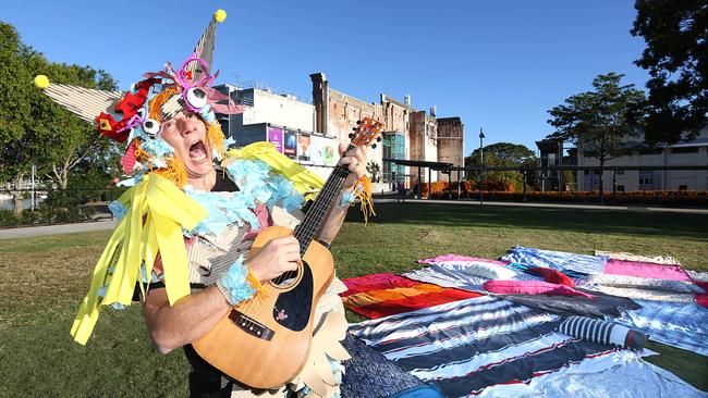 Performer Tim Jackman lets rip with a monster theme at the Brisbane Powerhouse on a giant rug as a promo for Powerkids. (no other kids at shoot)