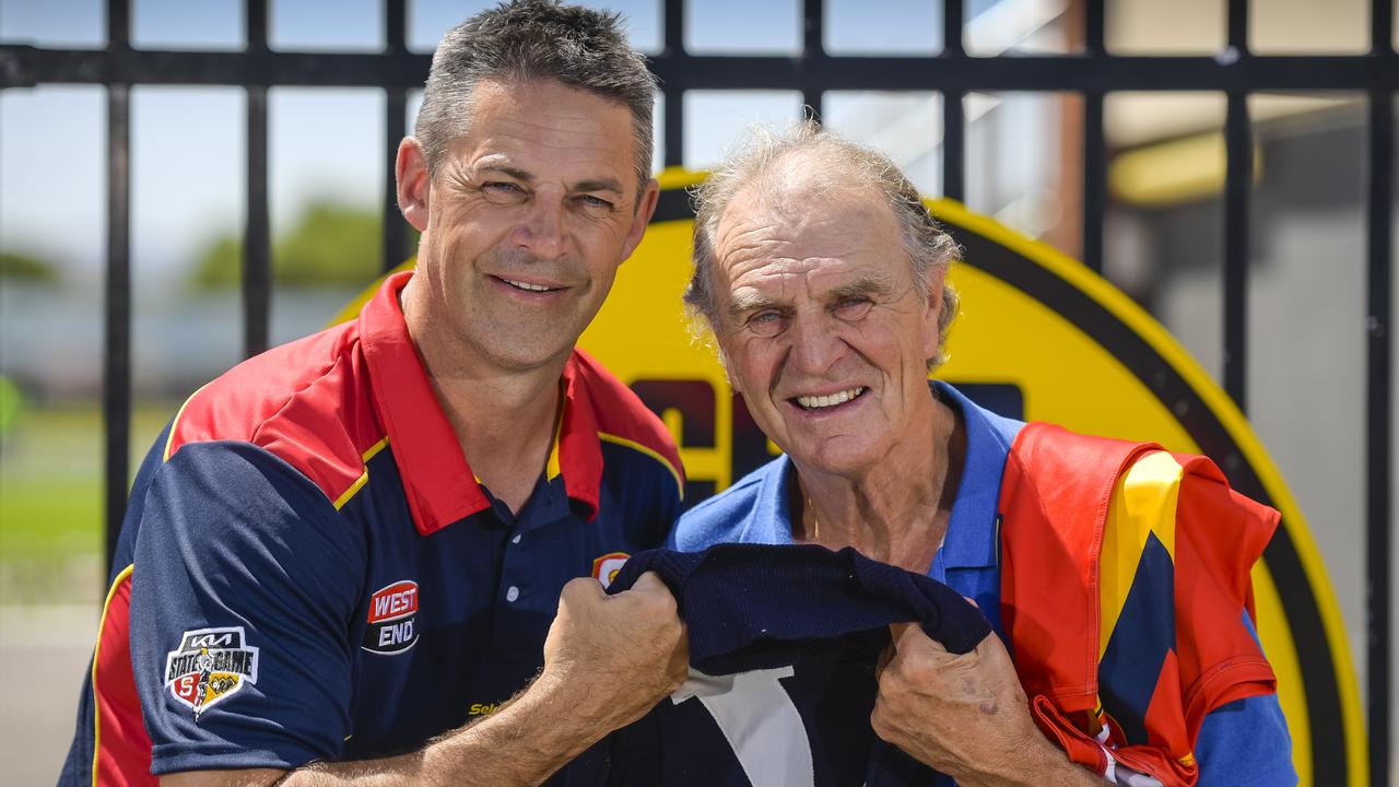 SANFL state coach Jade Rawlings (left) with Glenelg and state legend Graham Cornes at the Bay Oval, which will host the April 6 clash against the VFL. Picture: Roy VanDerVegt