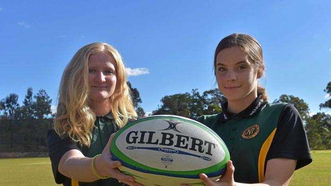 READY TO BATTLE: James Nash State High rugby players Emily Turner and Eliza Black take on Siena College today. Picture: Bec Singh