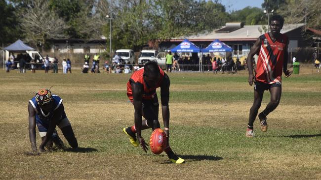 Players in action during the Tiwi Island Football League grand final between Tuyu Buffaloes and Pumarali Thunder. Picture: Max Hatzoglou