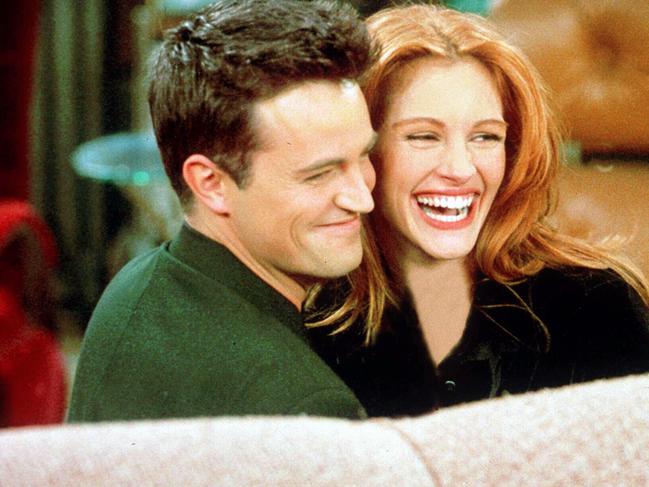 Perry and Roberts began dating after meeting when she guest starred on Friends.