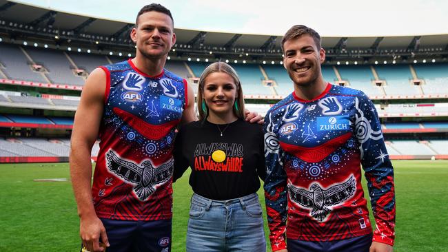 Melbourne Demons Steven May, far left, and Jack Viney, far right launch the Narrm Football Club along with Indigenous artist Ky-ya Nicholson Ward Ben Gibson / Melbourne Football Club