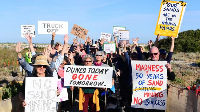 Protesters against sand carting from Semaphore block access to Semaphore Beach on Tuesday. Picture: AAP/Mark Brake