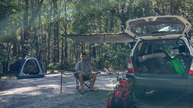 Enjoying a rare moment of unstress under the awning in Greenpatch, Jervis Bay. Image: supplied.