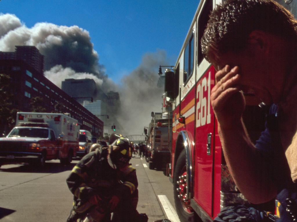 A New York firefighter is overcome with emotion following the 9/11 attacks. Picture: Universal History Archive/UIG via Getty Images