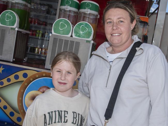 Milla Pollard and Elli-Jane Pollard in Sideshow Alley at the 2024 Swan Hill Show Picture: Noel Fisher