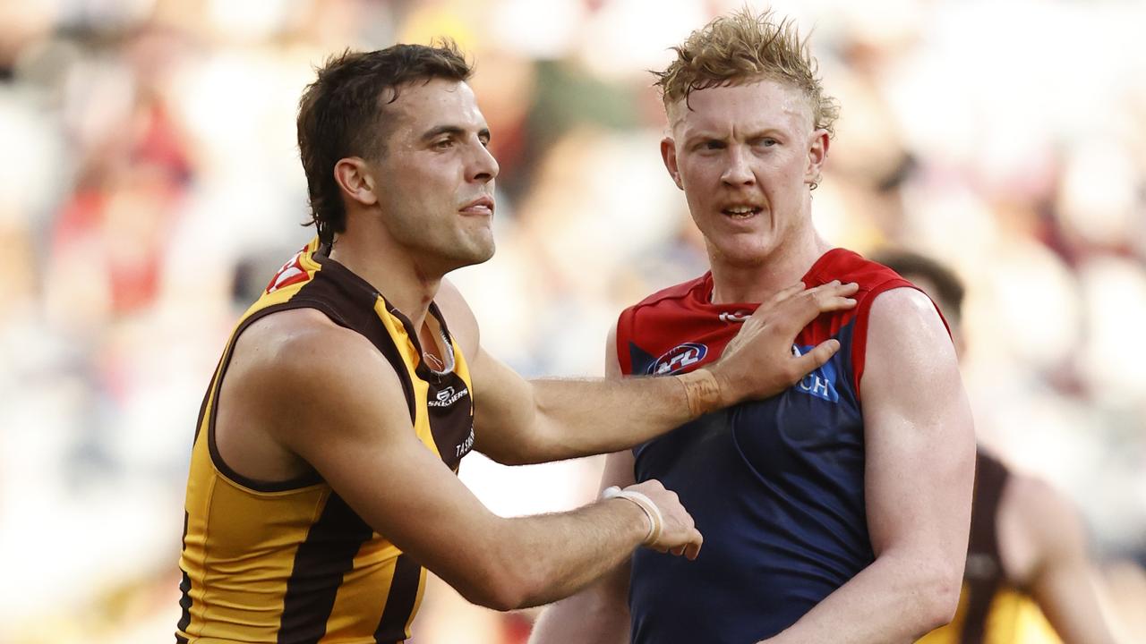 Finn Maginness of the Hawks plays a tight tag on Clayton Oliver of the Demons. Picture: Darrian Traynor/Getty Images