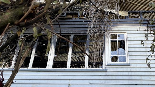 Fire crews spent the early hours of Wednesday morning battling flames that engulfed a historic Gympie in the heart of the city. House fire on Horseshoe Bend, Gympie on April 12, 2023. Picture: Christine Schindler