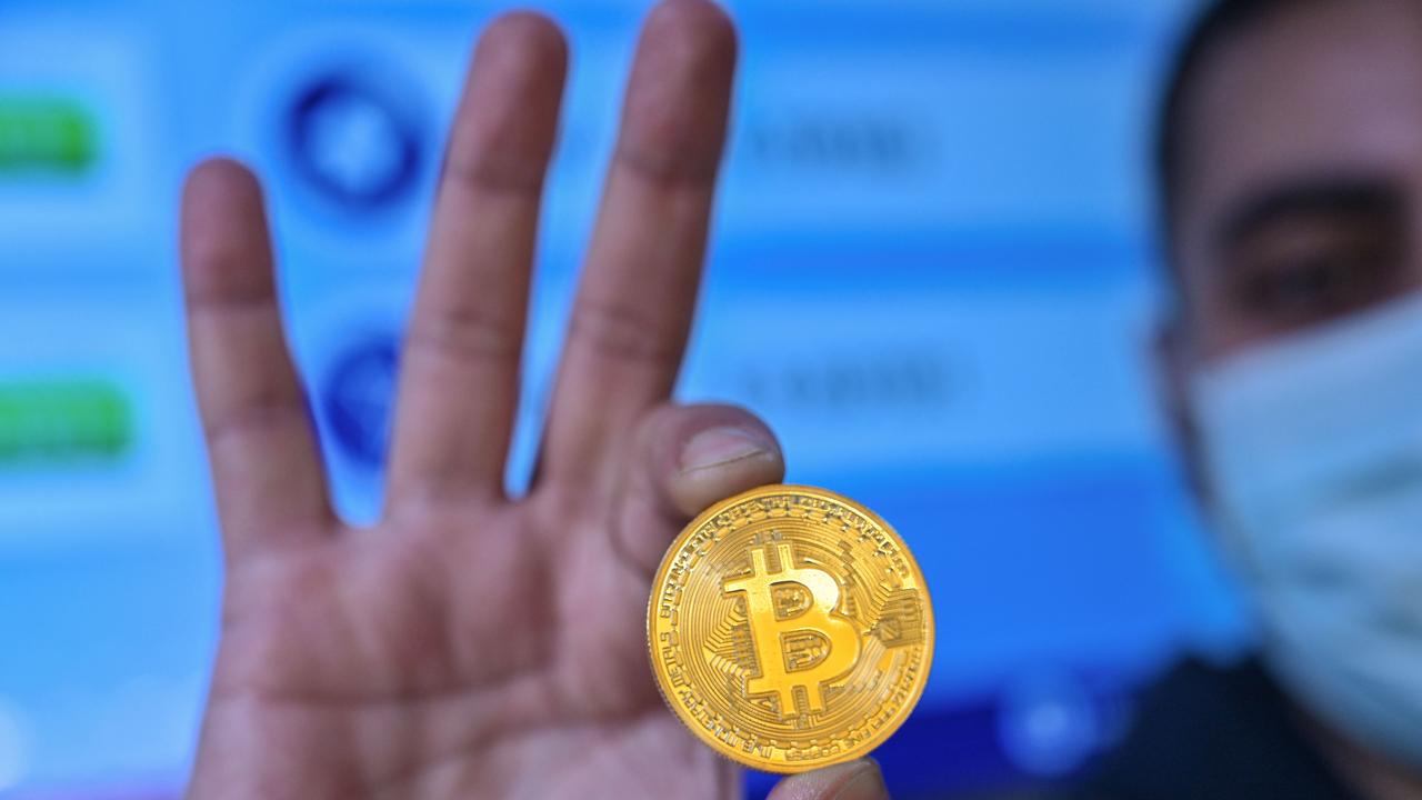 Cryptocurrency traders are being warned that the ATO will apply extra scrutiny in the upcoming tax season. Picture: Ozan Kose/AFP