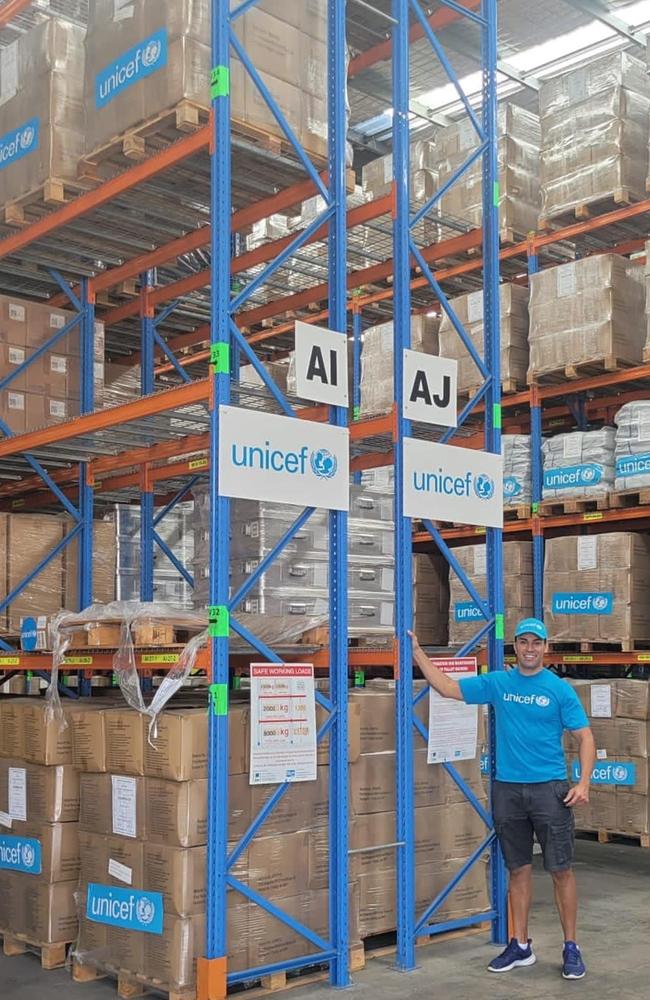 Tongan Olympian and UNICEF Pacific ambassador Pita Taufatofua has helped pack boxes of supplies destined for his home nation aboard the HMAS Adelaide which is expected Picture: Facebook