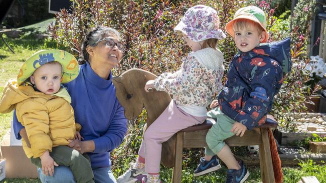 (From left) Scott Paterson, Georgette Ahfock, Darcy Stepanoff and Elijah Usher. Georgette Ahfock is recognised for her commitment to excellence in early childhood education and care. Picture: Nev Madsen.