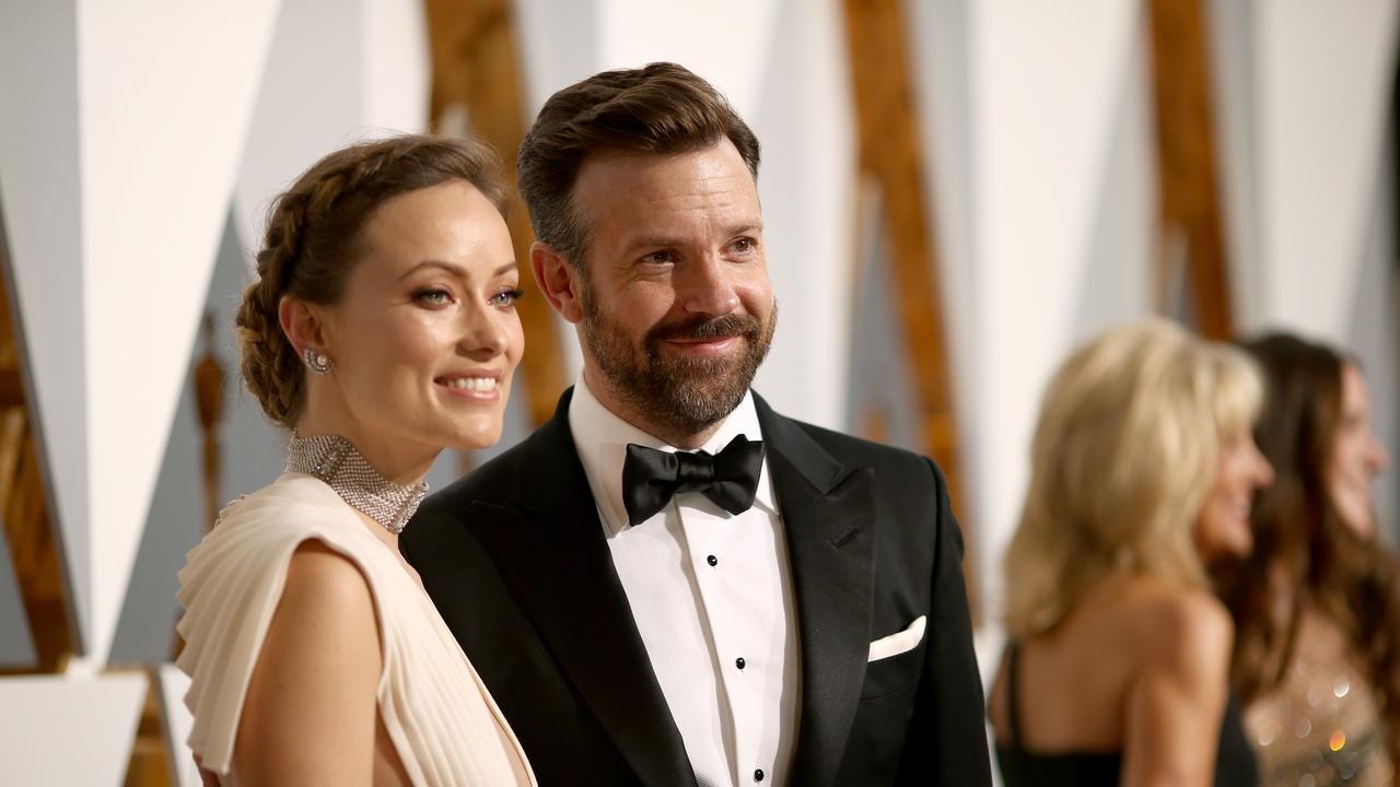 Happier times: Wilde and Jason Sudeikis at the 2016 Oscars. Picture: Christopher Polk/Getty