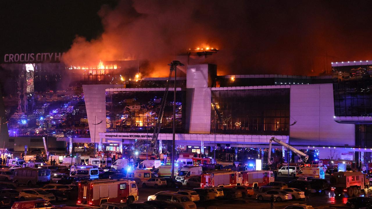 The attackers set fire to the concert hall after a shooting rampage. Picture: AFP