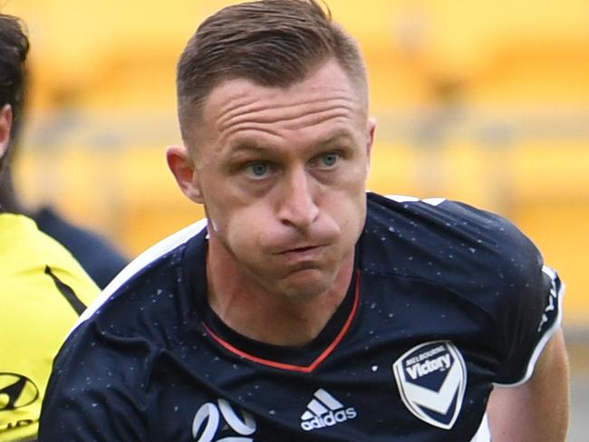 Besart Berisha of the Melbourne Victory plays in front of Andrija Kaludjerovic of the Phoenix in the A-League Football match between the Phoenix and Melbourne Victory at Westpac Stadium in Wellington, New Zealand, Sunday, December 3, 2017.  (AAP Image/SNPA, Ross Setford) NO ARCHIVING, EDITORIAL USE ONLY