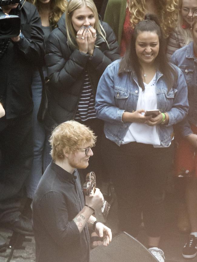 Ed Sheeran with his award. Picture: Sarah Matray