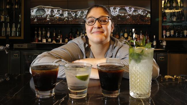 Bankstown Sports beverage team leader Phoebe Lambrou with some of the combinations she has made from the alcohol-free spirits. Picture: Robert Pozo