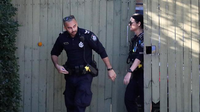 Police conducting a search at Arana Hills. Photographer: Liam Kidston.