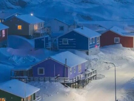 ONE TIME WEB USE ONLY - NO REUSE - MUST SEEK PHOTOGRAPHER PERMISSION FOR FURTHER USAGE - NO EXCEPTIONS -  National Geographic Announces Winners of 2019 Travel Photo Contest. Chosen from thousands of entries, National Geographic has unveiled the grand prize winner of the 2019 Travel Photo Contest. Weimin Chu’s winning photo, “Winter in Greenland” depicts the fishing village of Upernavik in northwestern Greenland. Historically, Greenlandic buildings were painted multiple colors to indicate different functions, from red storefronts to blue fishermen’s homes—a useful distinction when the landscape is blanketed in snow. Today, colorful homes still dot the snowy landscape.“It felt so harmonious. The whole land was covered by white, cold snow, and the blue tint at dusk made it even cooler. But the light from the windows, street lights and the family of three made the world warm again,” says Chu. “I love the contrast and mood of this scene. I was busy taking continuous pictures at that time, trying to capture the best moment.” Picture: William Chu /National Geographic Travel Photo Contest