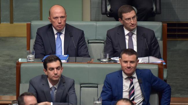 Peter Dutton, rear left, prepares his next move. Picture: AFP