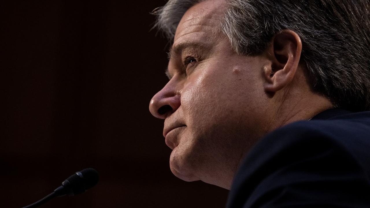 FBI Director Christopher Wray testifying today. Picture: Graeme Jennings/AFP