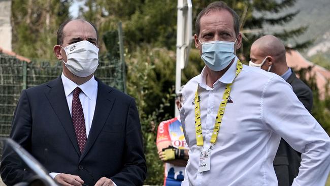 Tour de France Director Christian Prud'homme (R) and French Prime Minister Jean Castex attend the 8th stage of the Tour de France. Picture: AFP.