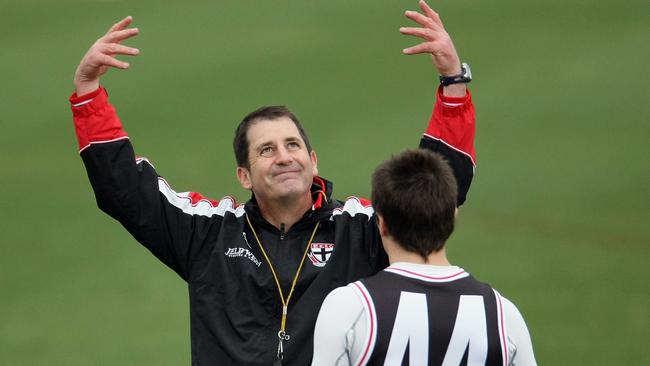 Ross Lyon talks with Stephen Milne during a St Kilda training session. Picture: Getty Images