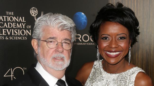 Producer George Lucas, left, and his wife Mellody Hobson in 2013 at The 40th Annual Daytime Emmy Awards in Beverly Hills. Picture: AP Photo/Entertainment Fusion Group, Ryan Miller