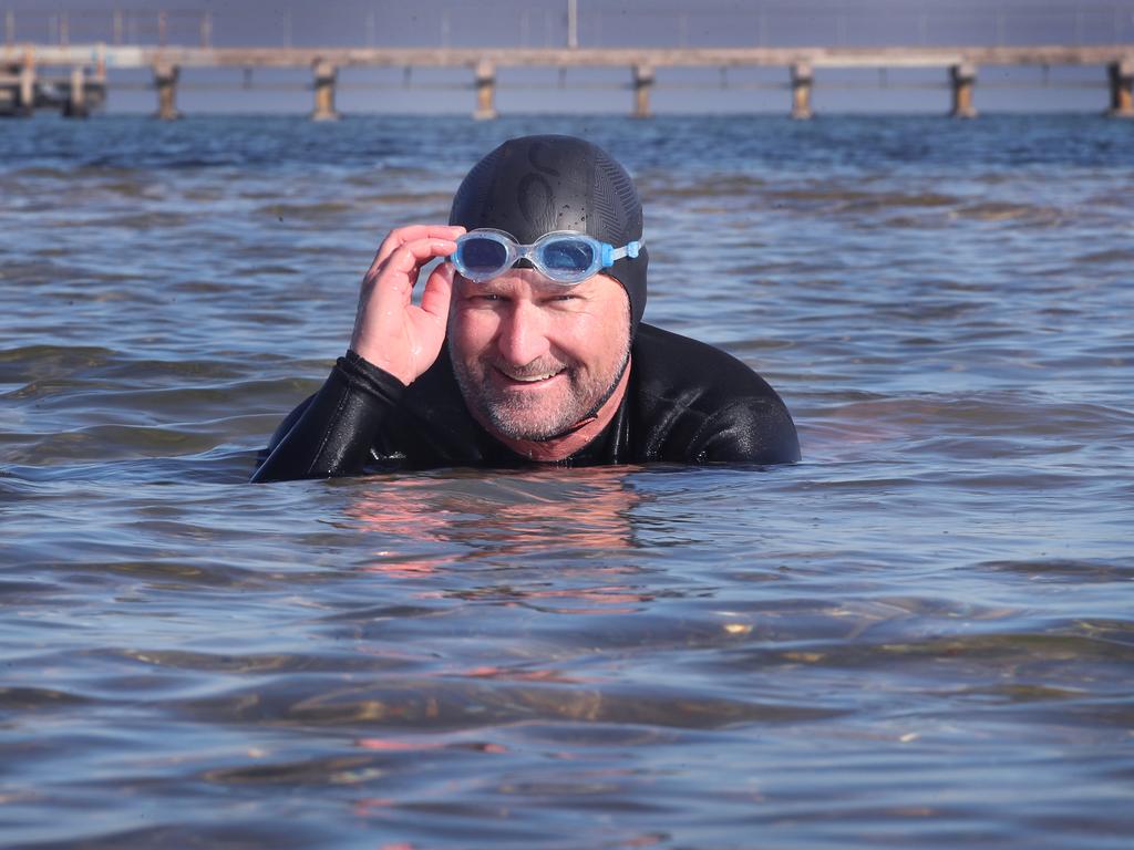 Dean Gilbert took a dip in Brighton on a cold winter day in Melbourne. Picture: David Crosling