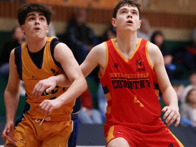 ACT's Jordan Doherty and SA Country's Henry Pedler during the Under-16 National Championships. Picture: Michael Farnell