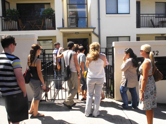 Rent crisis - about 25 people in rental market queue to inspect a one bedroom apartment in Clovelly. Chahaija Hunter inspects the home