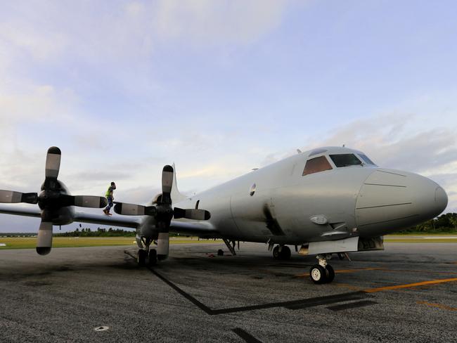 Onboard a RAAF P3 Orion surveillance  plane between Darwin and Sri Lanka as part of Operation Sovereign Boarders. The crew bed down the aircraft for the night on at the RAAF base on the Cocos Islands  .  Pic Nathan Edwards .