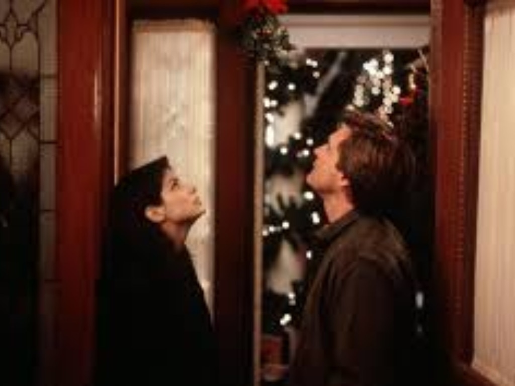 20. While You Were Sleeping (1995)<br/>This one’s for all the hopeless romantics out there. Sandra Bullock is at her finest, playing a lonely transit worker who gets caught in a web of lies (and accidental engagements). It all starts when she saves a handsome stranger’s life, and his family mistakes her for his fiancée. Awkward? Definitely. But oh so hilarious and very entertaining watching her fall for the brother.