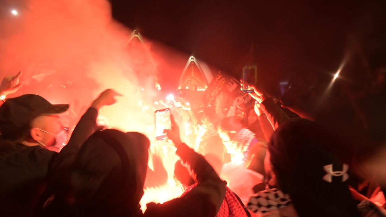 Many of the people in the crowd were livestreaming the event on social media. Picture: NCA NewsWire / Jeremy Piper