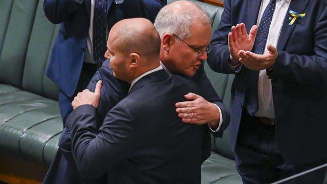 Prime Minister Scott Morrison congratulates Treasurer Josh Frydenberg on delivering the budget. Picture: Martin Ollman/Getty Images