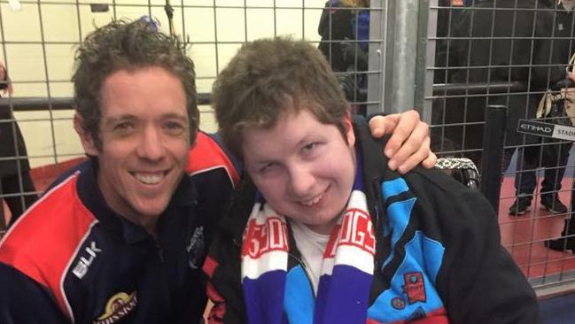 Cranbourne trainer Stuart Cunningham helped raise $1000 so Tyson Stanley, 15, can see his beloved Bulldogs play in the Grand Final. Picture: Supplied