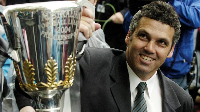 Port Adelaide coach Mark Williams with the 2004 premiership cup. Picture: Mark Brake