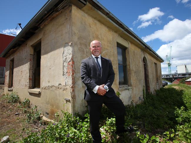 Marcus Freebody is an agent for L J Hooker real estate and is pictured in front of 40A Patrick St, a heritage listed property in central Hobart, which is coming up for auction soon. PIC: MATT THOMPSON