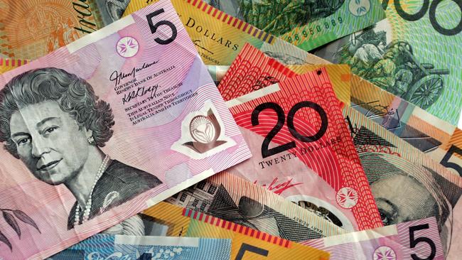 Most Australians are likely to see about $1080 in tax cuts in July next year, plus an extra $20 in their pay packet each week from later this month. Picture: Barry Leddicoat