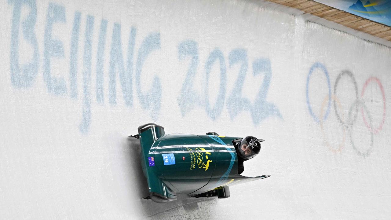 Australia's Breeana Walker takes part in a women's monobob bobsleigh training session at the Yanqing National Sliding Centre during the Beijing 2022 Winter Olympic Games in Yanqing on February 10, 2022. (Photo by Joe KLAMAR / AFP)