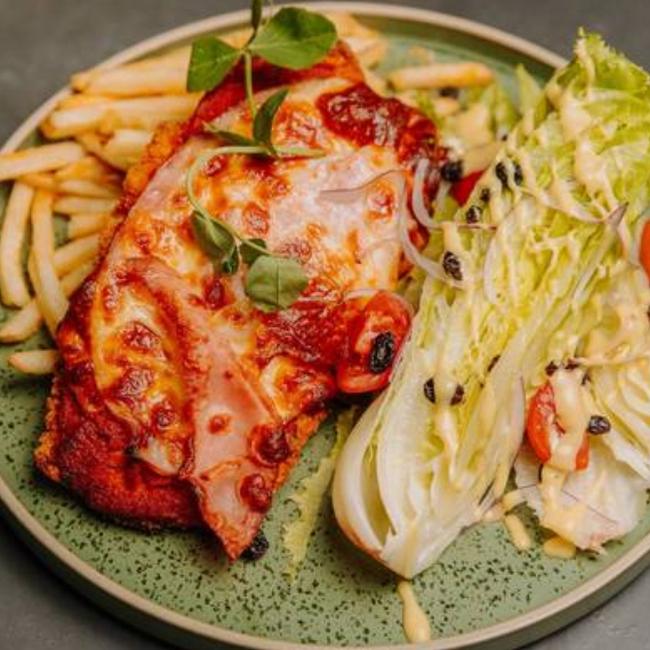 Newstead Social’s delicious classic take on the Chicken Parmie. Photo: Newstead Social