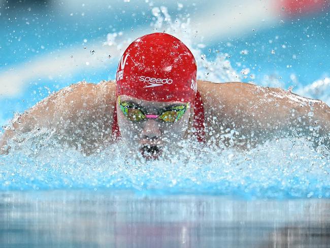 China's Zhang Yufei competes in   a heat of the women's 100m butterfly swimming event during the Paris 2024 Olympic Games at the Paris La Defense Arena in Nanterre, west of Paris, on July 27, 2024. (Photo by Jonathan NACKSTRAND / AFP)